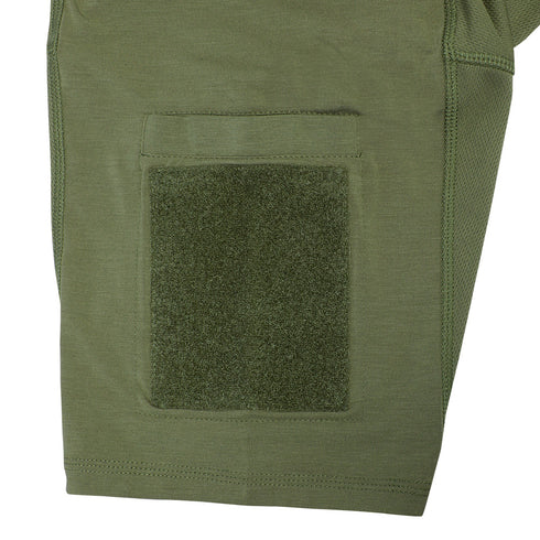 Close-up of the Condor Trident Short Sleeve Battle Top’s green sleeve, featuring a rectangular hook-and-loop fastener patch and stitched pocket, commonly used in tactical gear.